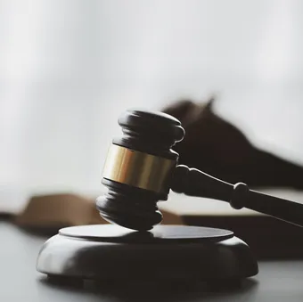 Gavel resting on a table