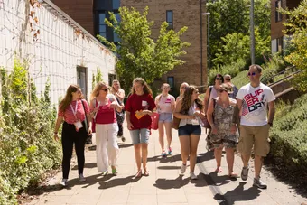 A student ambassador giving a tour of the Treforest campus with a group of open day visitors.
