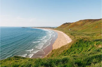 Rhossili Bay and beach on the Gower peninsula on the coast of South Wales.