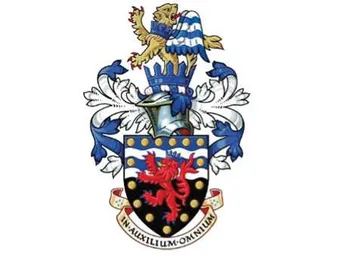 The Devon and Cornwall Police logo - it is medieval style crest featuring a lion with blue and white wings on top of a knites helmet wearing a crown surrounded by blue and white feathers. Under the helmet is a shield containing a red lion wearing a blue crown. Underneath it is a ribbon style banner with the Latin motto 
