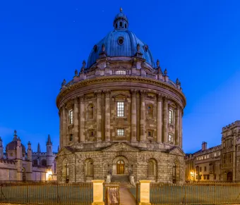 Radcliff camera in Oxford lit up against a blue night sky