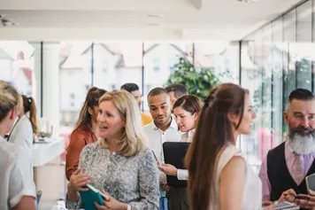 Business professionals attending business conference