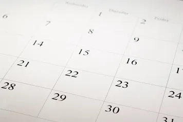 High angle view of a blank calendar with calendar date.