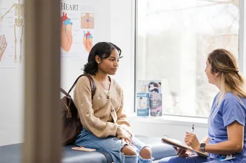 Female student attending a nurse's appointment