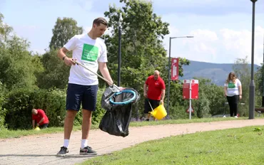 usw staff picking up litter on the pontypridd treforest campus