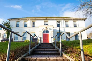 Sunny exterior shot of Ty Crawshay