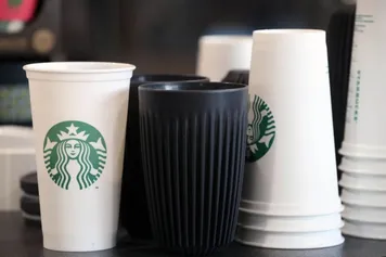 three reusable cups sitting on the counter at Stilts