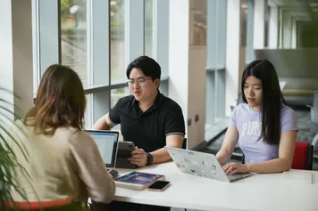 Students sitting in the USW Careers Service office