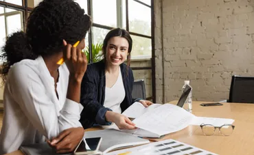 Business people discussing papers