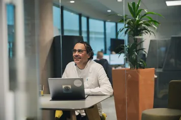 Man sat at laptop