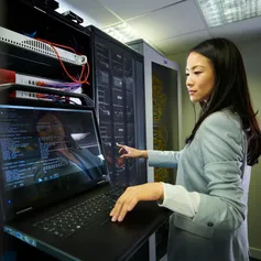 Woman using tech in early career