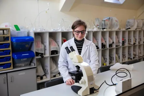 Forensic Science student, Abi, using a micrscope at the labs on Glyntaff campus