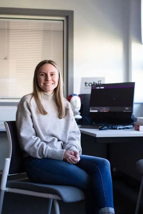Psychology student, Odette, smiles for profile shot