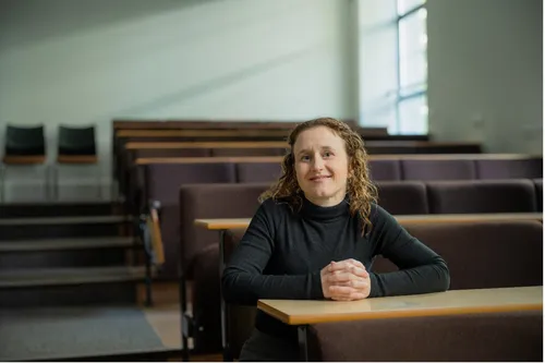 Law student Rebecca smiles for a profile shot