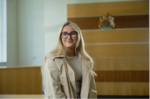 Law student Tiegan smiles for a profile shot