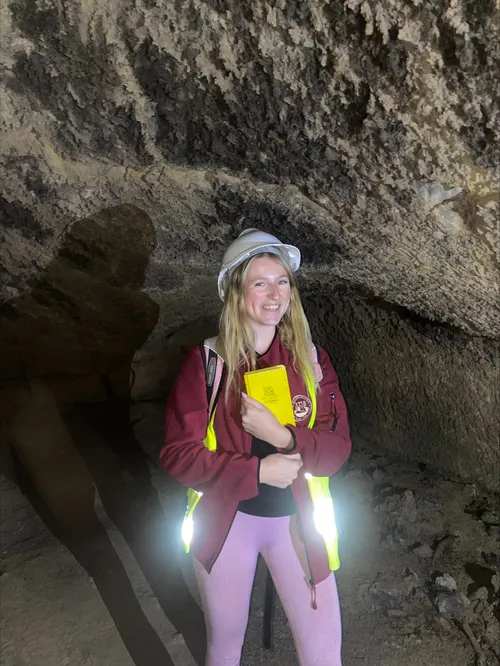 Gabriella Rosi standing in a cave