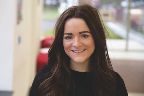A close-up of Civil Engineering graduate Bethan Jones smiling at the camera