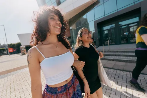 Two USW students walking outside of Cardiff Campus - Atrium