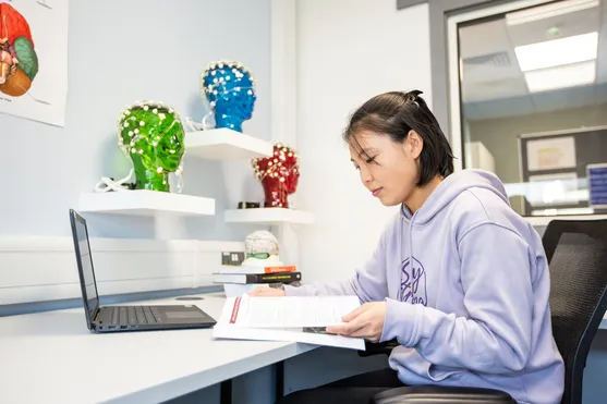 Psychology student working in the psychology lab on-campus.
