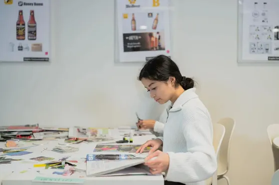 Advertising student working at a desk