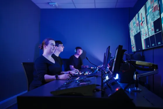 Lighting and Live Event Technology students working together in a studio.