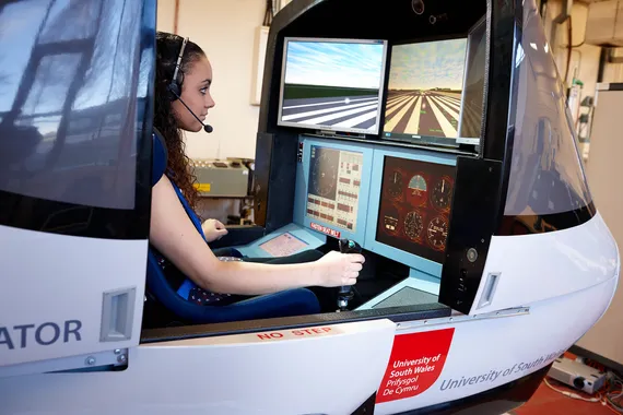 A student using the flight simulator on treforest campus