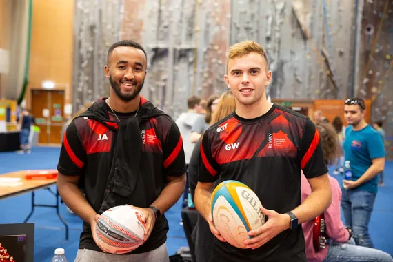 Two students from the Rugby Society at Treforest Welcome Fest