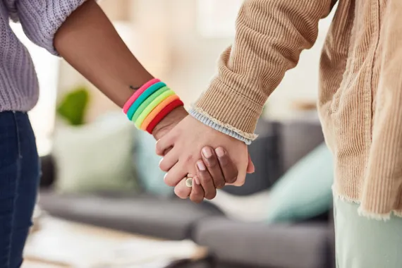 Shot of an unrecognisable couple holding hands