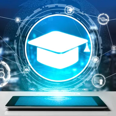 An animated graduation cap floating above a tablet screen