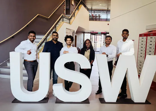 MBA Global students pose at Newport Campus