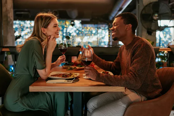 A couple at a restaurant on a date