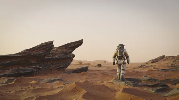 Darlun o syniad artist o astronaut yn cerdded ar arwyneb Mawrth