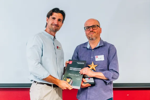 Teachers' and Advisers' Awards winner Darren Church receiving his award.