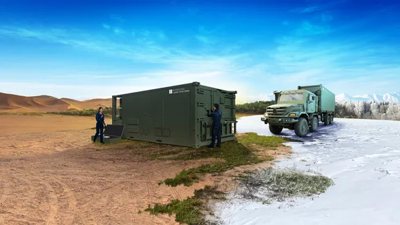 Marshall Land Systems modular shelter and vehicle demonstrated in desert and snow-covered environments