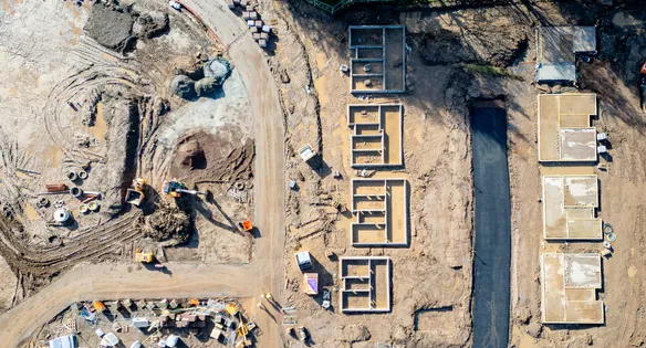 An ariel view of a building site with equipment