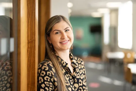 Dr Rebecca Peters smiling at the camera