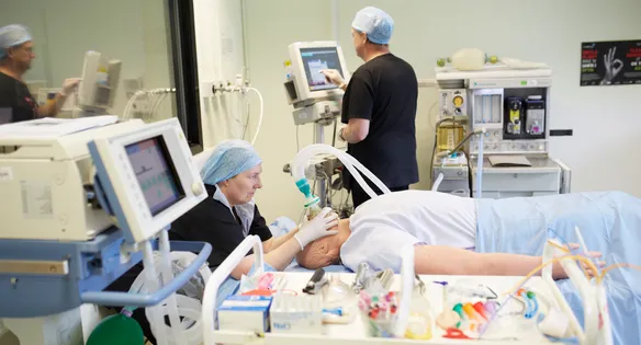 Student nurses taking care of mannequin patients in the clinical simulation centre.