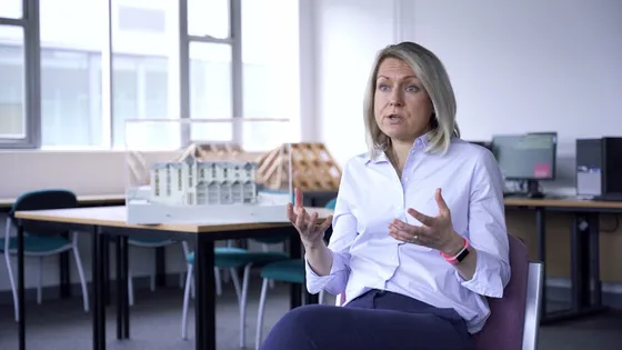 Miranda Thomas, Built Environment Lecturer, talking to camera in classroom