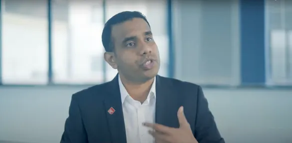 Lecturer talking to camera