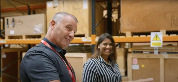 mba global lecturer and student in a warehouse