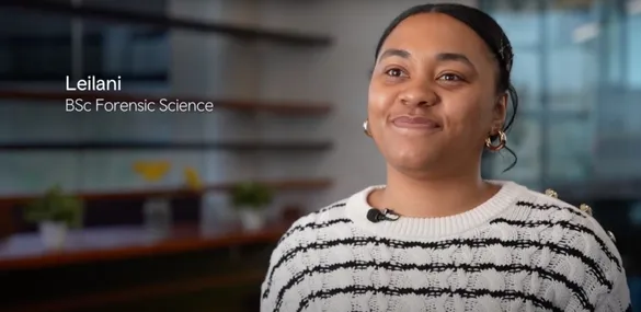 Leilani, forensics science student, smiling at the camera