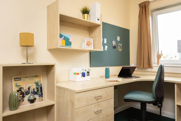 Desk area of a bronze room in newport student village