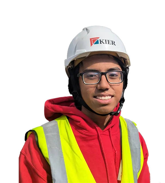 A cutout of BEng civil engineering student Jaren Cervantes smiling at the camera while wearing a red hoodie, a yellow high visibility jacket and a white hard hat.