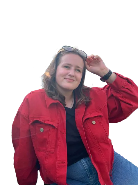 A cutout of Hannah Erpels smiling while holding sunglasses on their head