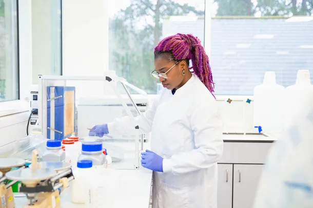 PHD student talatu usar working in a research lab