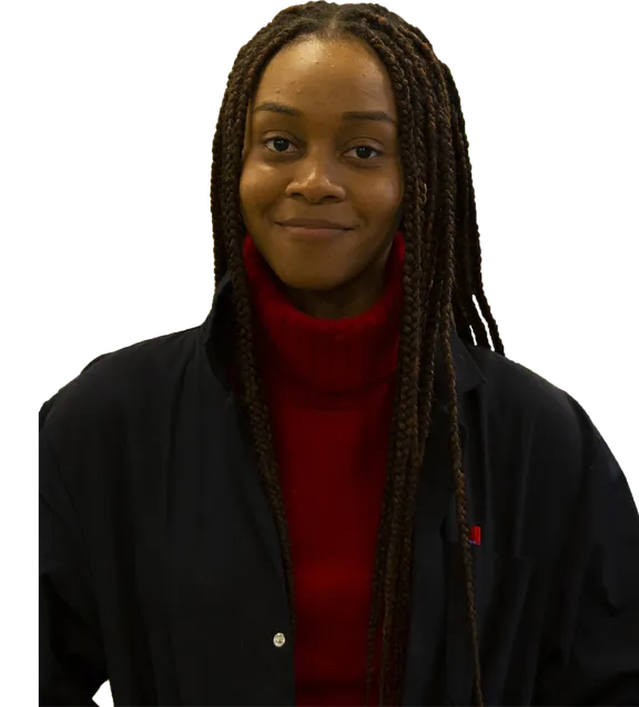 A cutout of student Ngozi Blessing Orji-Chukwu smiling at the camera while wearing a large red turtleneck jumper and a black coat