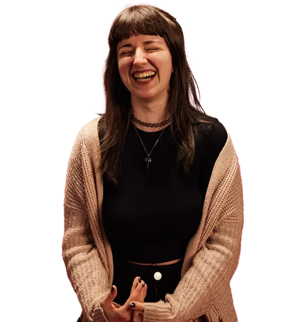 Psychology graduate, Tammie, smiling and laughing.