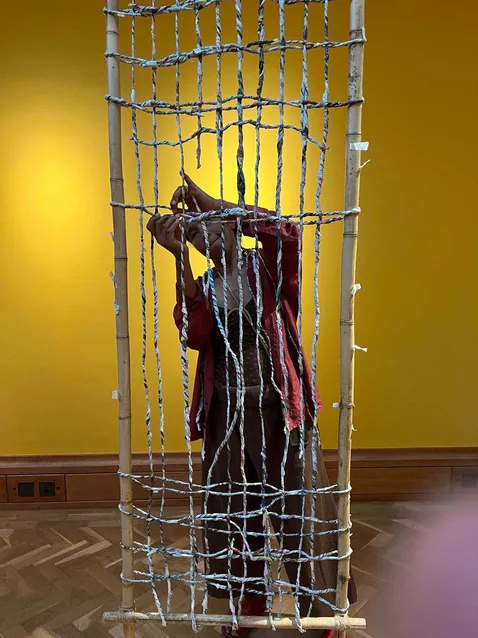 Adeola installing her art work at National Museum Wales