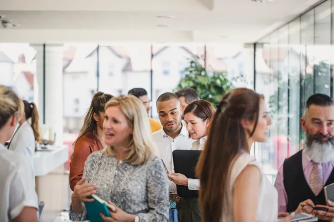 Business professionals attending business conference