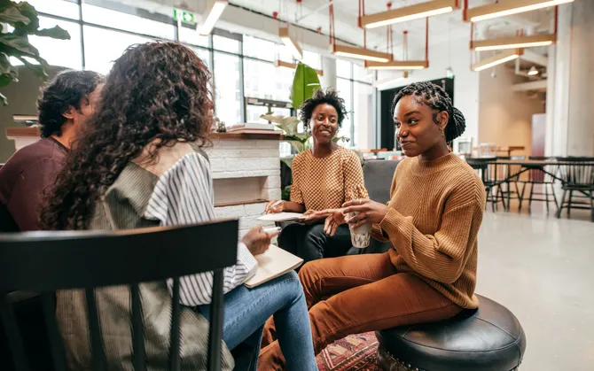 Group of women having a meeting in an office setting